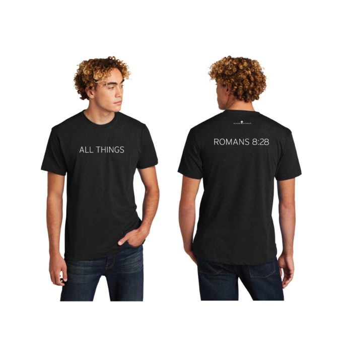 Male model wearing black T-shirt that reads All Things